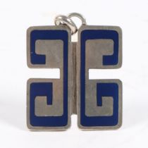 A GUCCI SILVER AND BLUE ENAMEL PENDANT.