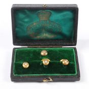 A SET OF FOUR 15 CARAT GOLD AND PEARL DRESS STUDS.