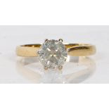 AN 18 CARAT GOLD DIAMOND SOLITAIRE RING.
