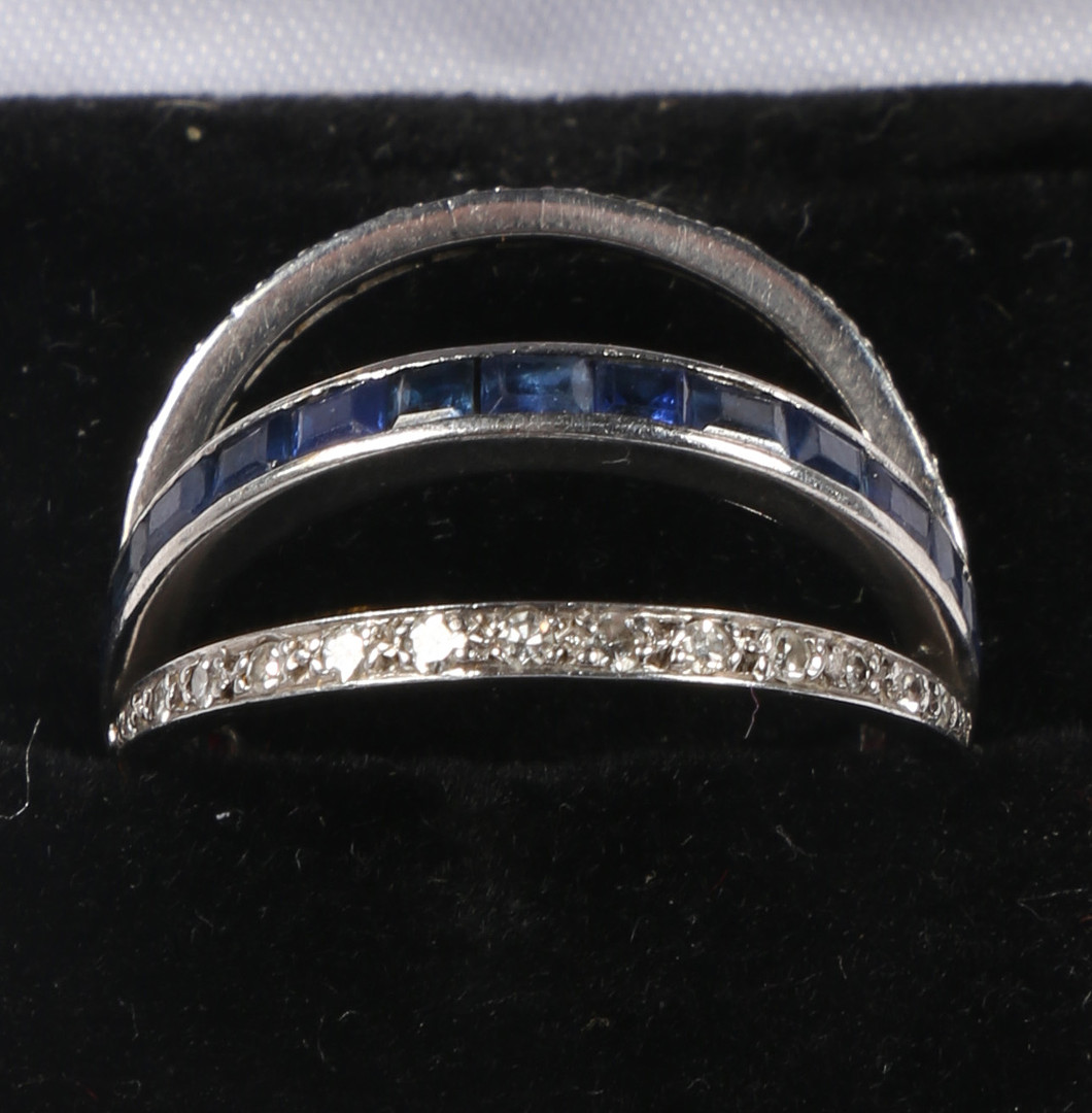 A SAPPHIRE, RUBY AND DIAMOND "DAY AND NIGHT" ETERNITY RING. - Image 6 of 6