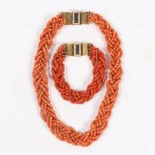 A CORAL BEAD NECKLACE AND BRACELET (2).