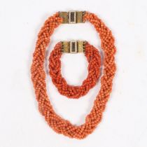 A CORAL BEAD NECKLACE AND BRACELET (2).