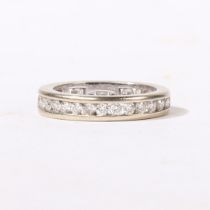 AN 18 CARAT WHITE GOLD AND DIAMOND FULL ETERNITY RING.