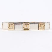 A GUCCI 18 CARAT GOLD AND SILVER BRACELET.