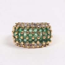 AN 18 CARAT GOLD, EMERALD AND DIAMOND RING.