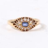 AN 18 CARAT GOLD SAPPHIRE AND DIAMOND RING.