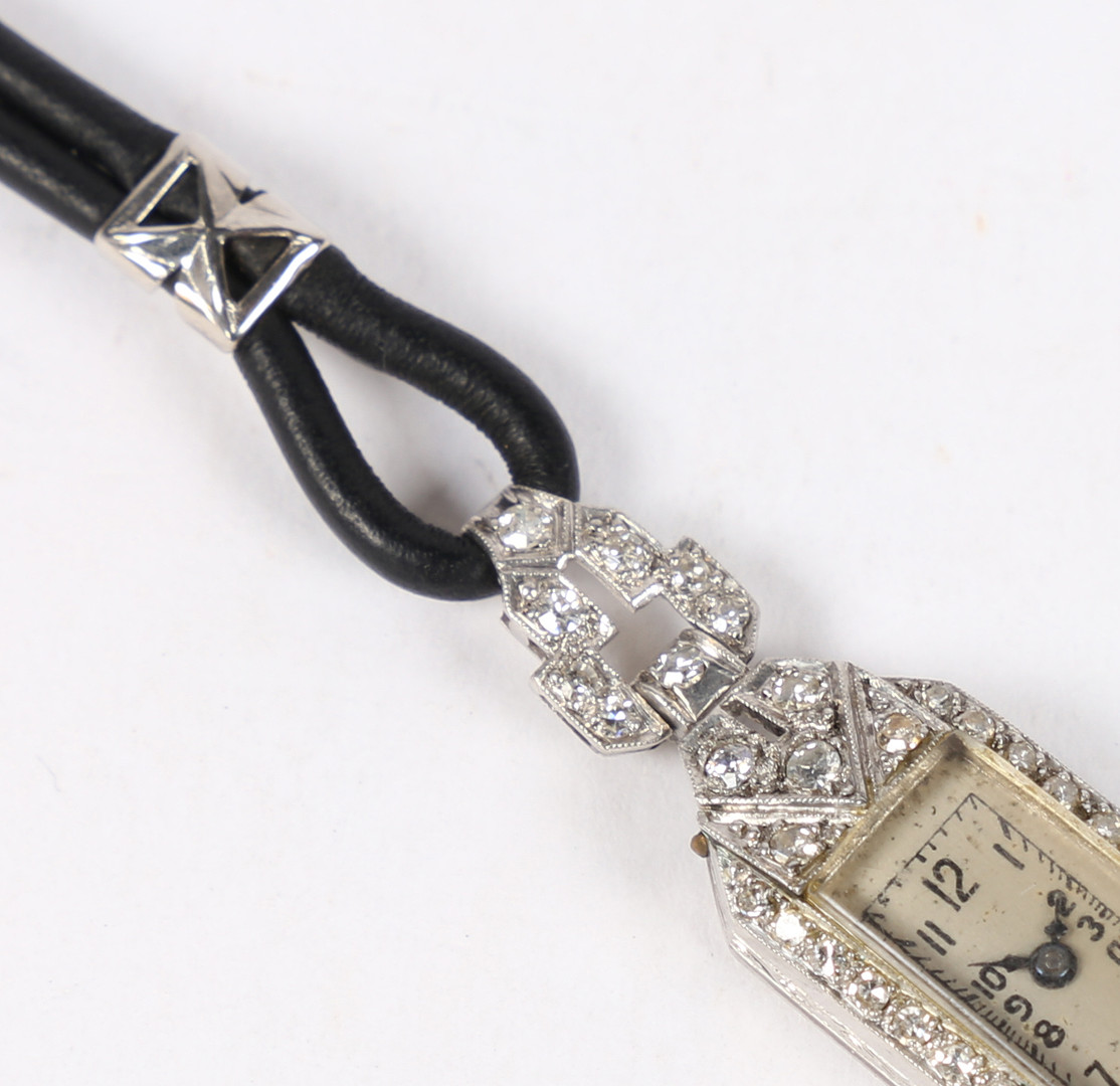 A PLATINUM AND DIAMOND SET LADIES COCKTAIL WATCH. - Image 4 of 6