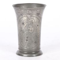 A SMALL PEWTER WRIGGLEWORK ROYAL PORTRAIT BEAKER, DUTCH, CIRCA 1700.