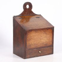 A GEORGE III OAK SALT BOX, CIRCA 1790.