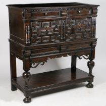 A PART LATE 17TH CENTURY OAK GEOMETRIC-MITRE MOULDED CHEST-ON-STAND, ENGLISH.