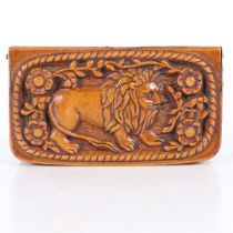 AN 18TH CENTURY SNUFF BOX CARVED FROM TAGUA NUT.