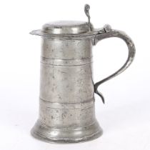 A RARE CHARLES II PEWTER FLAT-LID DOUBLE-BANDED FLAGON, WIGAN, CIRCA 1680.