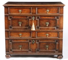 A CHARLES II OAK GEOMETRIC MOULDED CHEST OF DRAWERS, CIRCA 1680.