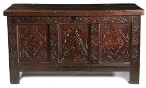 A CHARLES II OAK COFFER, DEVON, DATED 1682.