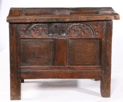 A 17TH CENTURY OAK COFFER OF SMALL PROPORTIONS.