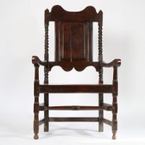 A CHARLES II PANEL-BACK OPEN ARMCHAIR, YORKSHIRE, CIRCA 1670.