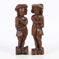 A SMALL PAIR OF 17TH CENTURY OAK FIGURAL TERMS, FLEMISH.