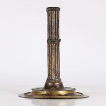 A RARE GILT-COPPER CANDLESTICK, FRENCH, CIRCA 1500.