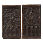 A PAIR OF 15TH CENTURY OAK TRACERY CARVED PANELS, ENGLISH, CIRCA 1480.