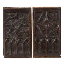 A PAIR OF 15TH CENTURY OAK TRACERY CARVED PANELS, ENGLISH, CIRCA 1480.