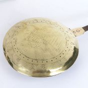 AN INTERESTING EARLY 17TH CENTURY BRASS AND IRON WARMING PAN, ENGLISH.