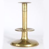 AN EXCEPTIONAL AND UNUSUALLY LARGE MID-17TH CENTURY BRASS TRUMPET-BASE CANDLESTICK, ENGLISH, CIRCA 1