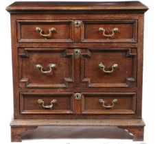 A CHARLES II OAK GEOMETRIC-MOULDED CHEST OF DRAWERS, CIRCA 1680.