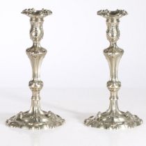 A PAIR OF GEORGE III PAKTONG CANDLESTICKS, CIRCA 1765.