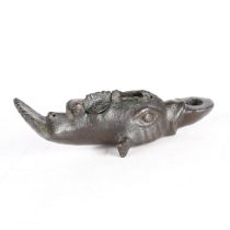 A ROMAN BRONZE DOLPHIN LAMP.