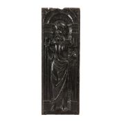 A 16TH CENTURY OAK CARVED PANEL.