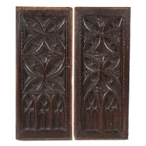TWO 15TH CENTURY OAK TRACERY CARVED PANELS, ENGLISH, CIRCA 1480.
