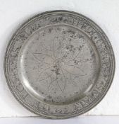 A GOOD AND DOCUMENTED QUEEN ANNE PEWTER MULTIPLE-REEDED WRIGGLEWORK PLATE, CIRCA 1700.