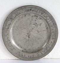 A GOOD AND DOCUMENTED QUEEN ANNE PEWTER MULTIPLE-REEDED WRIGGLEWORK PLATE, CIRCA 1700.