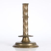 A RARE 16TH CENTURY BRASS ENGRAVED PILLAR CANDLESTICK, FRENCH.