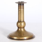 AN EXCEPTIONAL AND RARE MID-17TH CENTURY BRASS BALL-KNOP TRUMPET-BASE CANDLESTICK, ENGLISH, CIRCA 16