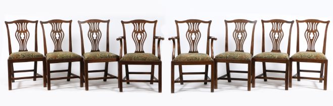 A SET OF EIGHT GEORGE III OAK DINING CHAIRS, CIRCA 1780.