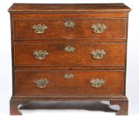 A GEORGE III OAK CHEST OF DRAWERS, CIRCA 1760.