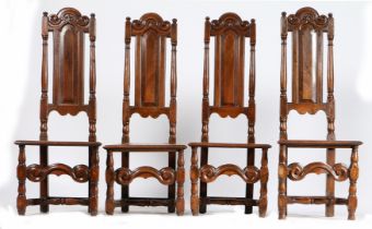 A SET OF FOUR WILLIAM & MARY ELM HIGH-BACK SIDE CHAIRS, CIRCA 1690.