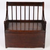 A REGENCY OAK MINIATURE/DOLL'S BOX-SETTLE, CIRCA 1820.