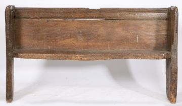 A MEDIEVAL OAK BENCH OR PEW CIRCA 14TH CENTURY, ENGLISH