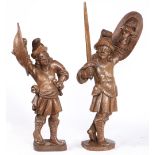 A PAIR OF 17TH CENTURY CARVED OAK SOLDIERS, BEARING ARMS, RESIDUAL PAINT, FLEMISH.