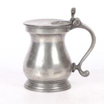 AN UNCOMMON PEWTER DOUBLE-VOLUTE BULBOUS-SHAPED MEASURE, CIRCA 1826-30.