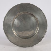 A CHARLES II PEWTER BROAD RIM PLATE, CIRCA 1680.