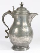 A MID-18TH CENTURY PEWTER BALUSTER-SHAPED LAVER/FLAGON, CIRCA 1750.