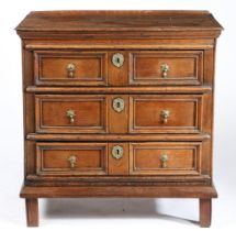 A SMALL CHARLES II OAK CHEST OF DRAWERS, CIRCA 1680.