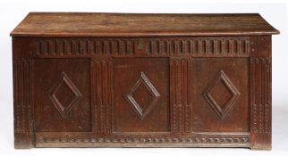 A LARGE 17TH CENTURY OAK COFFER.