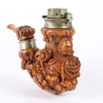 A 19TH CENTURY CARVED PIPE.
