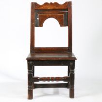 A CHARLES II OAK BACKSTOOL, CIRCA 1680.