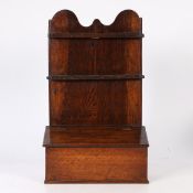 A GEORGE III OAK SPOON RACK, CIRCA 1800.