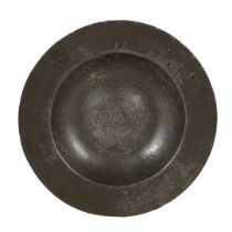 AN IMPORTANT PLANTAGENET PEWTER SAUCER OR SPICE PLATE, ENGLISH, CIRCA 1400.